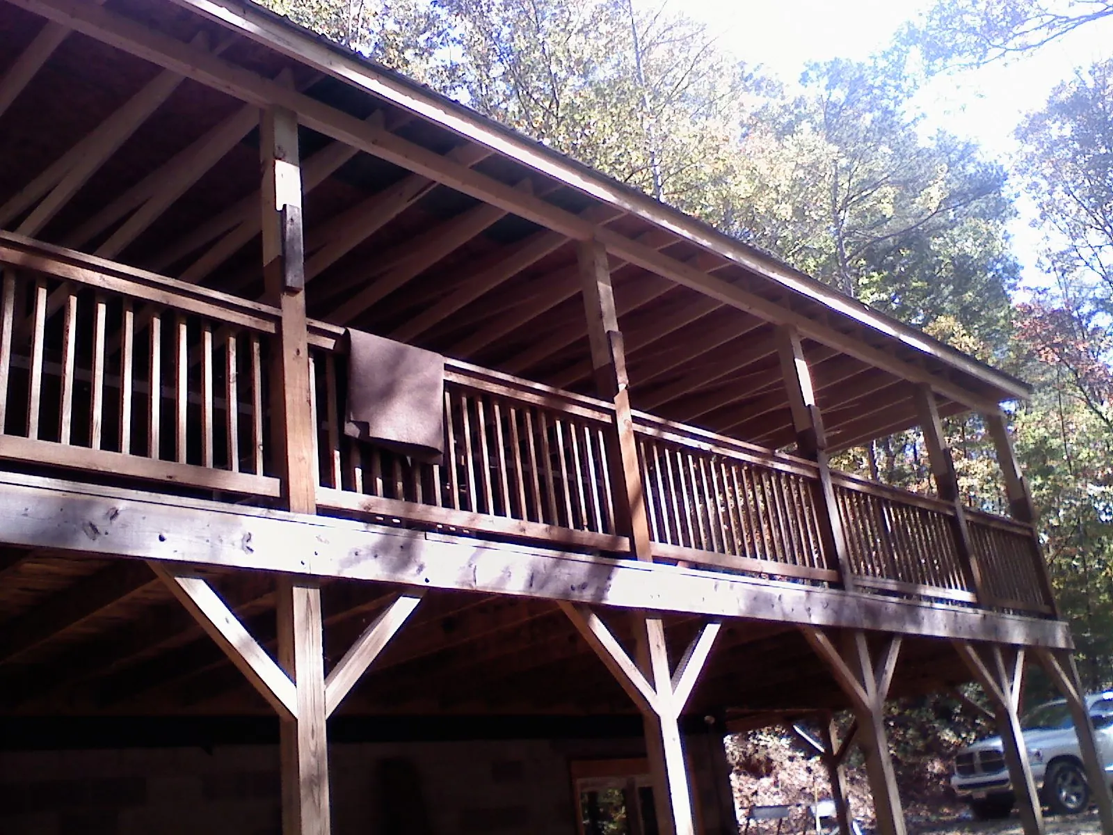 Timber framing under a new elevated porch and deck — Roof Leak Repair in Redwood by Roofing Brothers